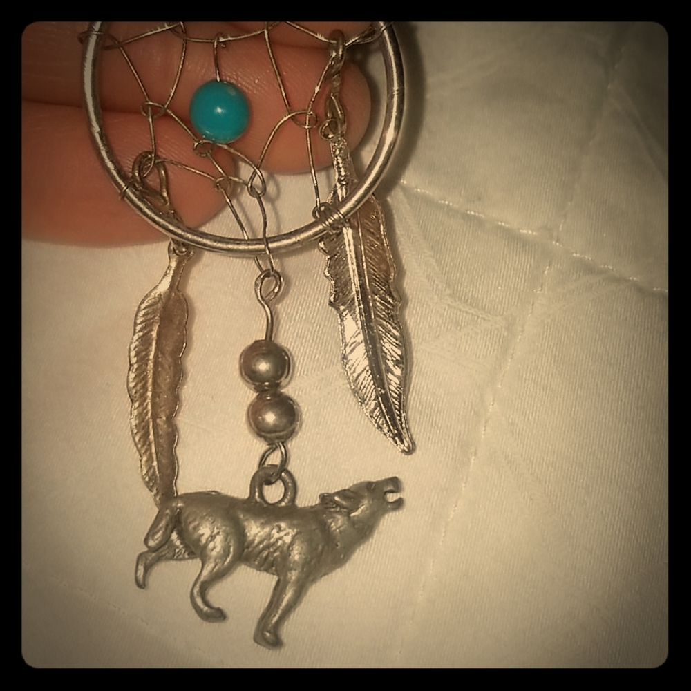 Dream catcher in pendant with Wolf